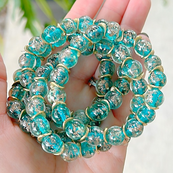 Lake blue firefly 8mm glass beaded bracelet with gold filled wavy spacer beads - Picture 3 of 4